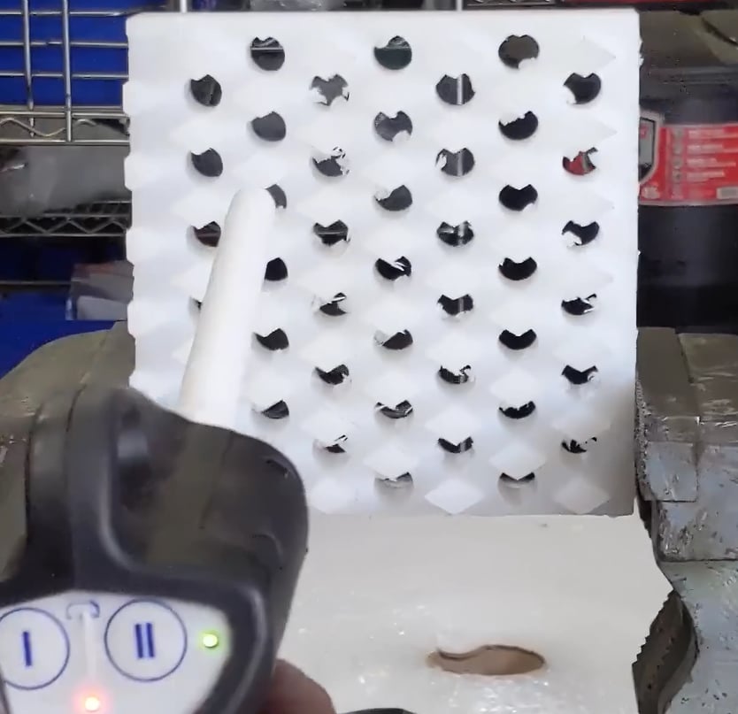 Hole deburring of plastic part with dry ice blasting