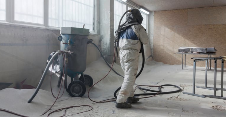 Sandblasting with grit